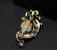 Stunning vintage look gold plated peacock turquoise stone queen brooch broach h2