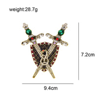 Sword shield brooch vintage look stunning diamonte gold plated christmas pin jj7