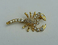 Gold plated scorpion brooch star sign cake pin - birth sign talisman protection