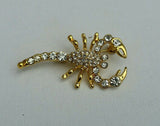 Gold plated scorpion brooch star sign cake pin - birth sign talisman protection
