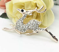 Stunning diamonte rose gold plated christmas running deer brooch cake pin b17