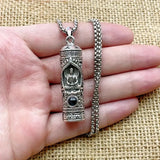 A rotating pendant of the Buddha Amitabha with scripture, a vintage and aged projection of Buddha statues, a trendy necklace of