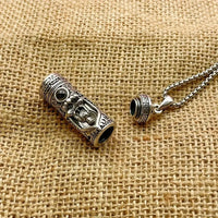 A rotating pendant of the Buddha Amitabha with scripture, a vintage and aged projection of Buddha statues, a trendy necklace of