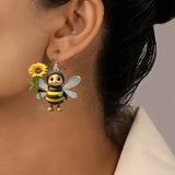 1 pair of original design little bee acrylic earrings holding sunflowers, a pair of beautiful and interesting ladies earrings g