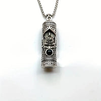 A rotating pendant of the Buddha Amitabha with scripture, a vintage and aged projection of Buddha statues, a trendy necklace of