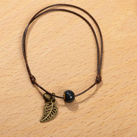Vintage Bronze Leaf Small Bell and Colorful Flower Glazed Ceramic Bead Pendant Leather Rope Anklet Women Ethnic Style Bracelet