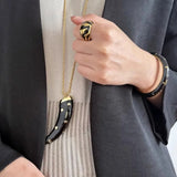 Double-sided horn pendant necklace
