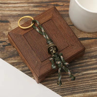 1PC Skull Head Keychain Car Biker Helmet Pendant Keychain Braided Rope Paracord Buddy Bag Hanging Backpack Doll Toy