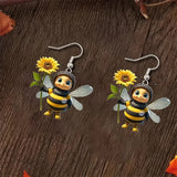 1 pair of original design little bee acrylic earrings holding sunflowers, a pair of beautiful and interesting ladies earrings g