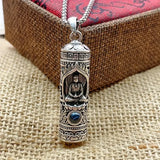 A rotating pendant of the Buddha Amitabha with scripture, a vintage and aged projection of Buddha statues, a trendy necklace of