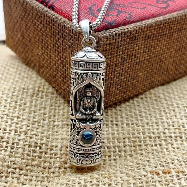 A rotating pendant of the Buddha Amitabha with scripture, a vintage and aged projection of Buddha statues, a trendy necklace of