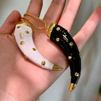 Double-sided horn pendant necklace