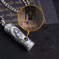 A rotating pendant of the Buddha Amitabha with scripture, a vintage and aged projection of Buddha statues, a trendy necklace of