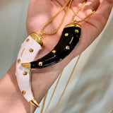 Double-sided horn pendant necklace