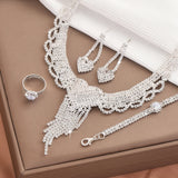 Women's fashionable and exquisite claw chain design, peach heart tassel jewelry set, party and holiday gifts