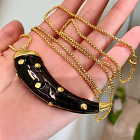 Double-sided horn pendant necklace